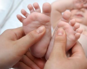 Paediatric Massage - gentle hands on infant feet