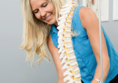 Dr. Cheryl van der Mark demonstrating with model spine